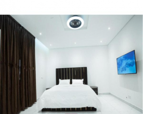 A Prampram 4 bed room house with swimming Pool GH.